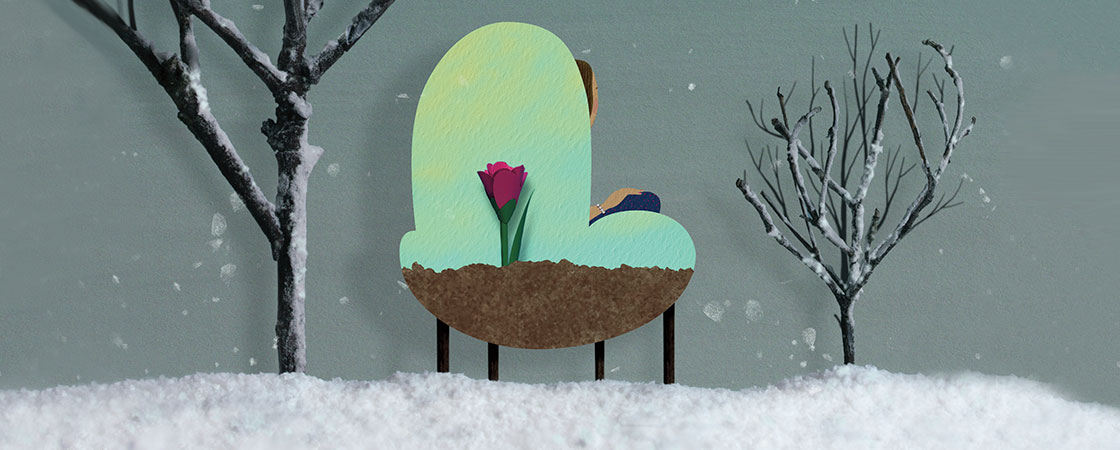 Illustration of a girl sitting on a chair with a rose on the back as it snows around her