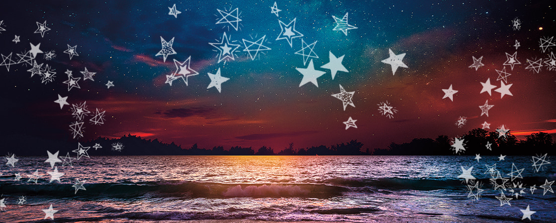 Stars in the skies with the ocean below it