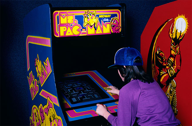 Young girl playing video games on computer after online school and  homework. Gamer using shooting action play for entertainment and fun with  keyboard and monitor. Child enjoying game Stock Photo - Alamy