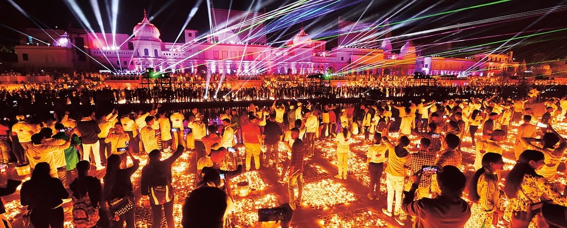 Image of people gathered at a light festival during the night