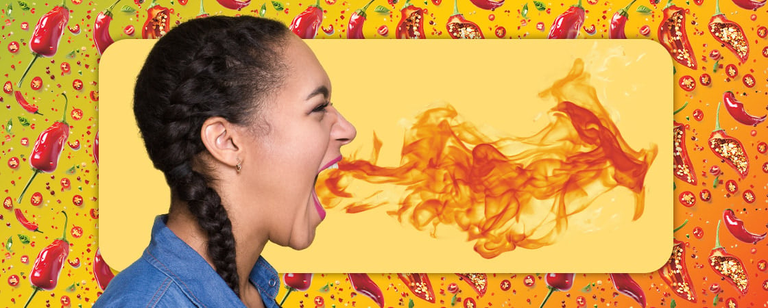 Image of person exhaling flames out of their mouth